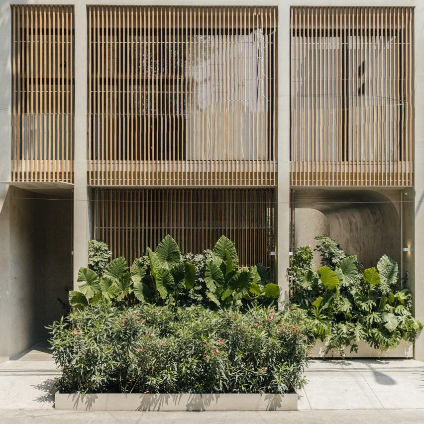 Wooden lattices screen concrete hotel by PPAA in Mexico City