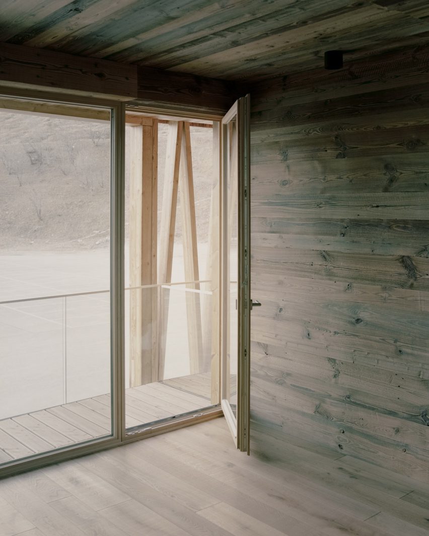 The wooden interiors of the Climber's Refuge by LCA Architetti