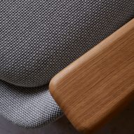 A chair upholstered with Camira Flax fabric by Camira