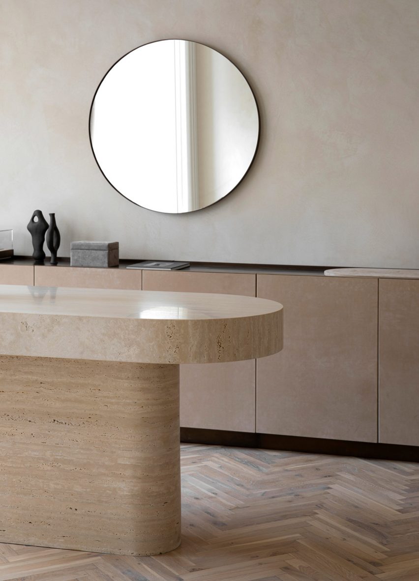 Travertine counter in retail interior by Norm Architects