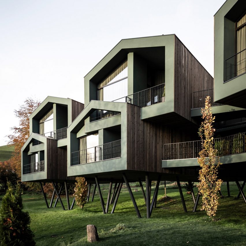 Network of Architecture raises "treehouse" hotel on stilts above park in South Tyrol