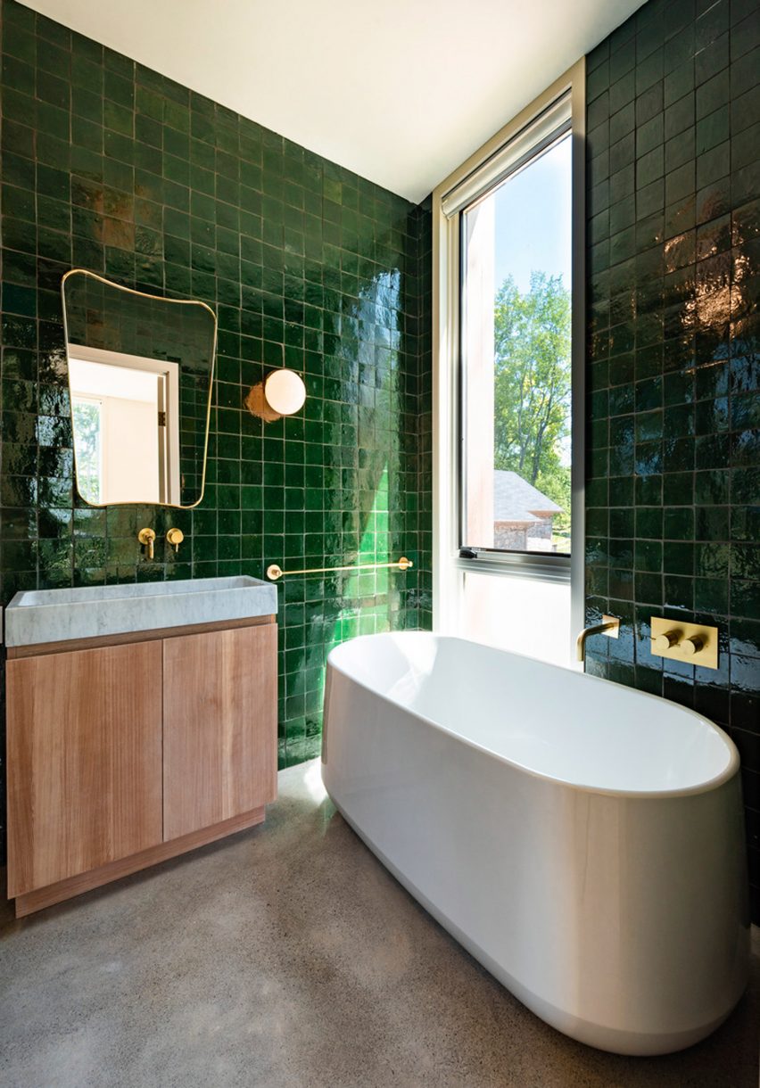 Bathroom with green times Fold House by Partisans