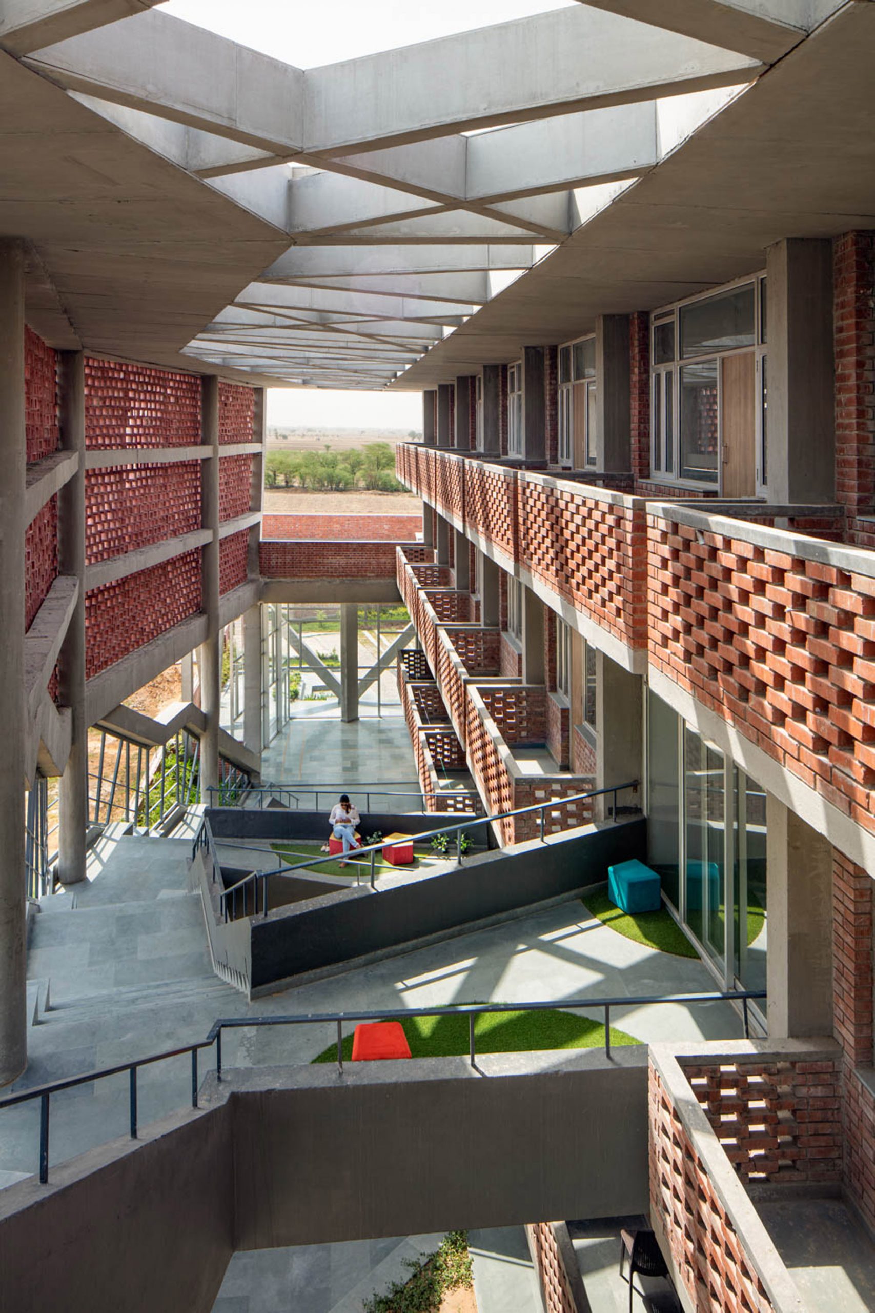 View from staircase of Girls Hoste Block by Zero Energy Design Lab