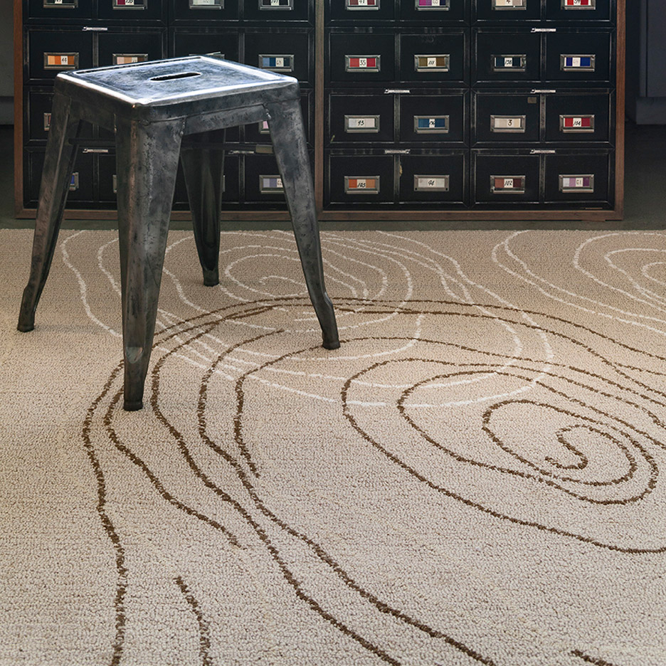 A room featuring the Heavenly Star I rug by Raymond Loewy for Tai Ping Carpets