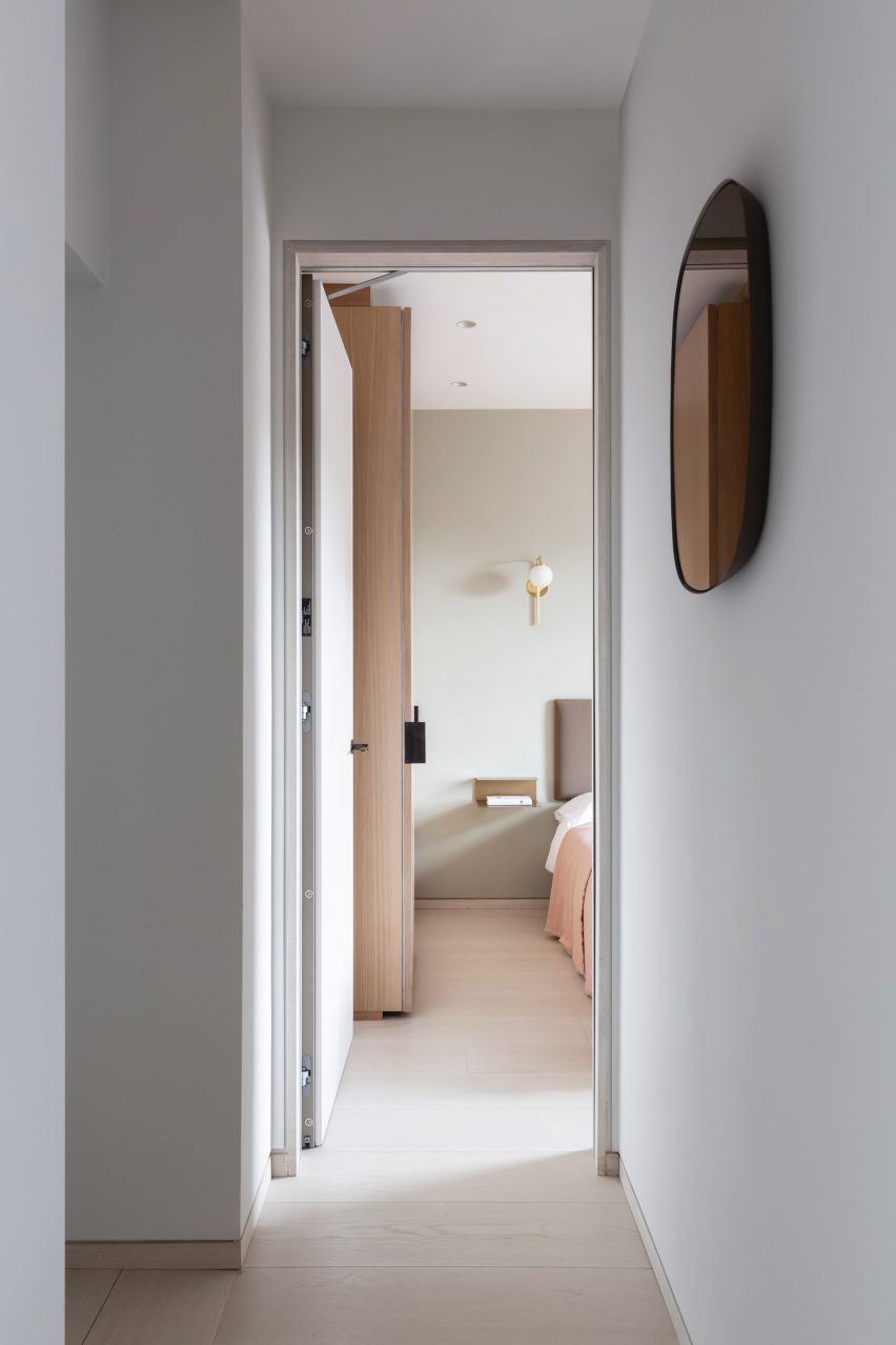 Hallway view into bedroom of Mayfair pied-à-terre by MWAI