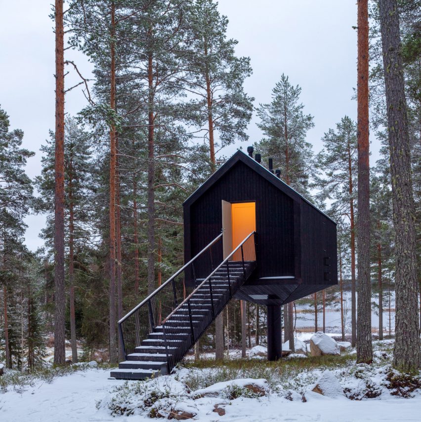 A Finnish cabin clad in black-painted wood