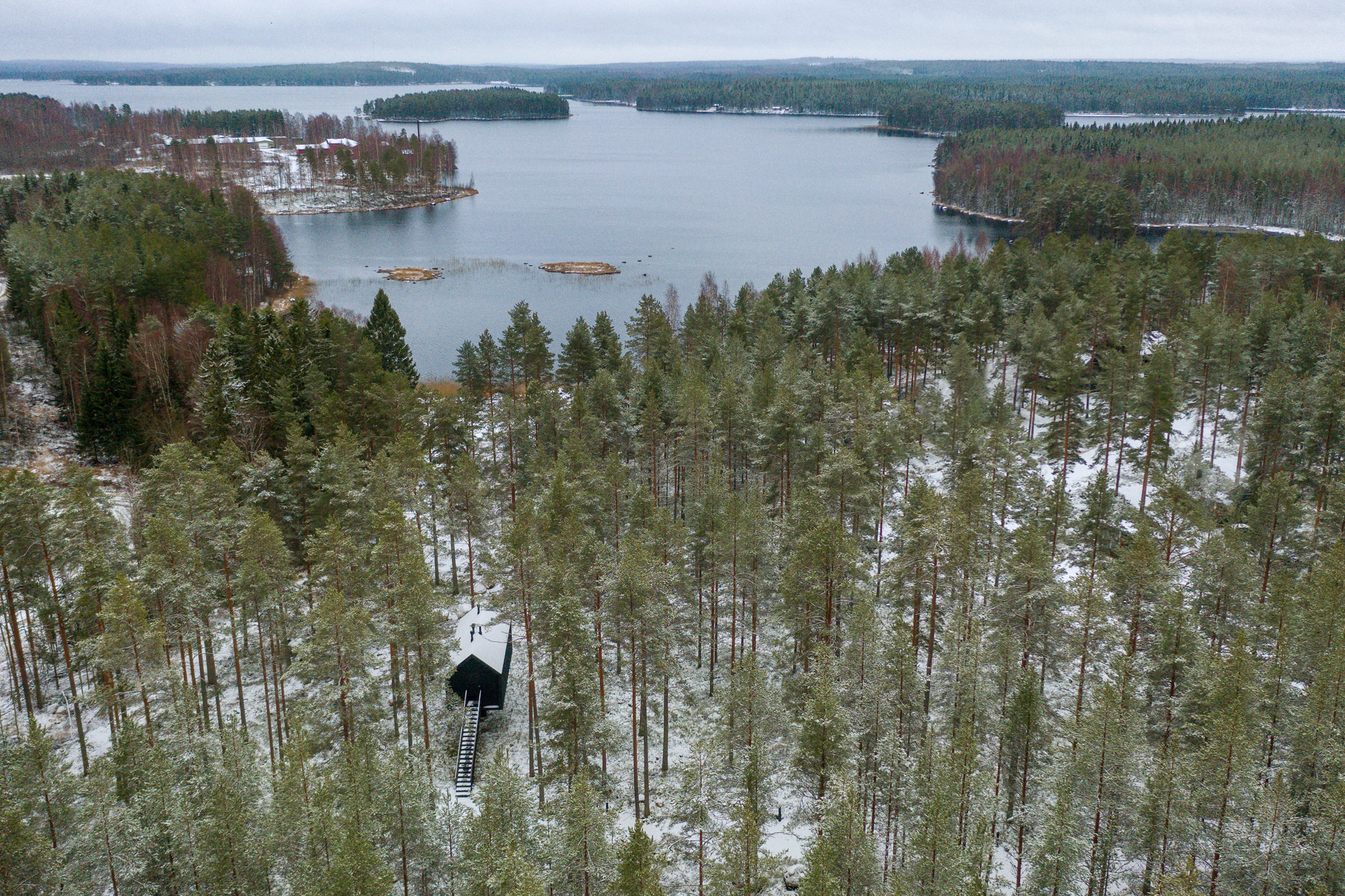 An aerial view of Studio Puisto's woodland cabin in Finland 