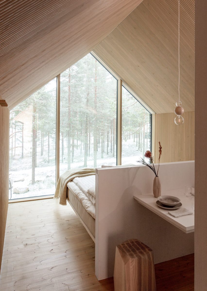 The light-wood interiors of a woodland cabin in Finland