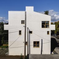 Jean Verville Architecte creates "luminous" white triplex in Montreal