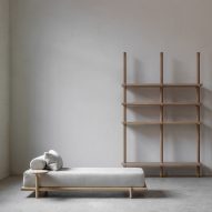 Daybed, library and armchair in Nomad furniture by Nathalie Deboel