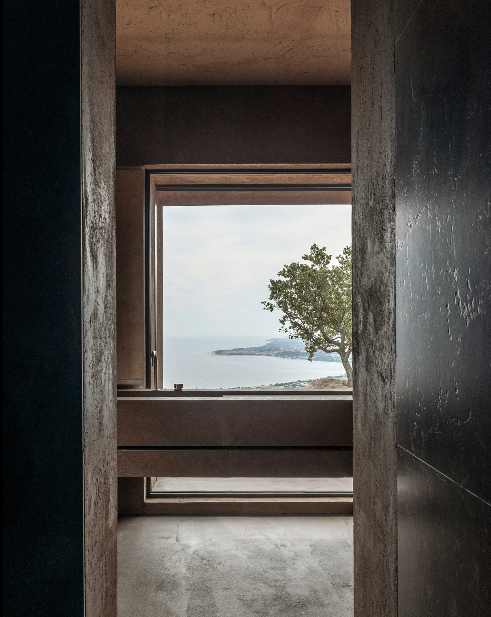 A bathroom sink overlooking a gulf