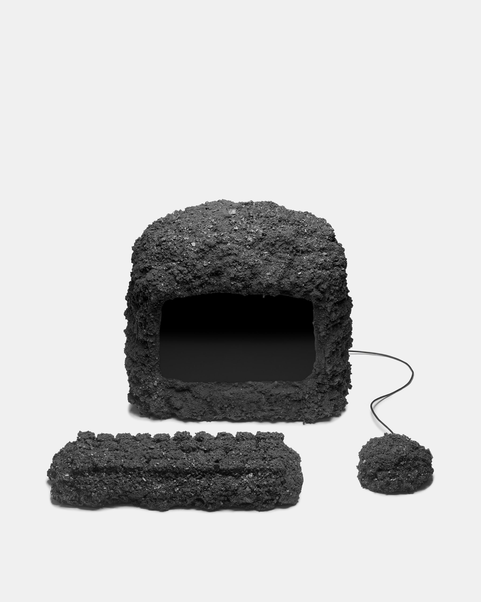 Desktop computer and mouse made of coal