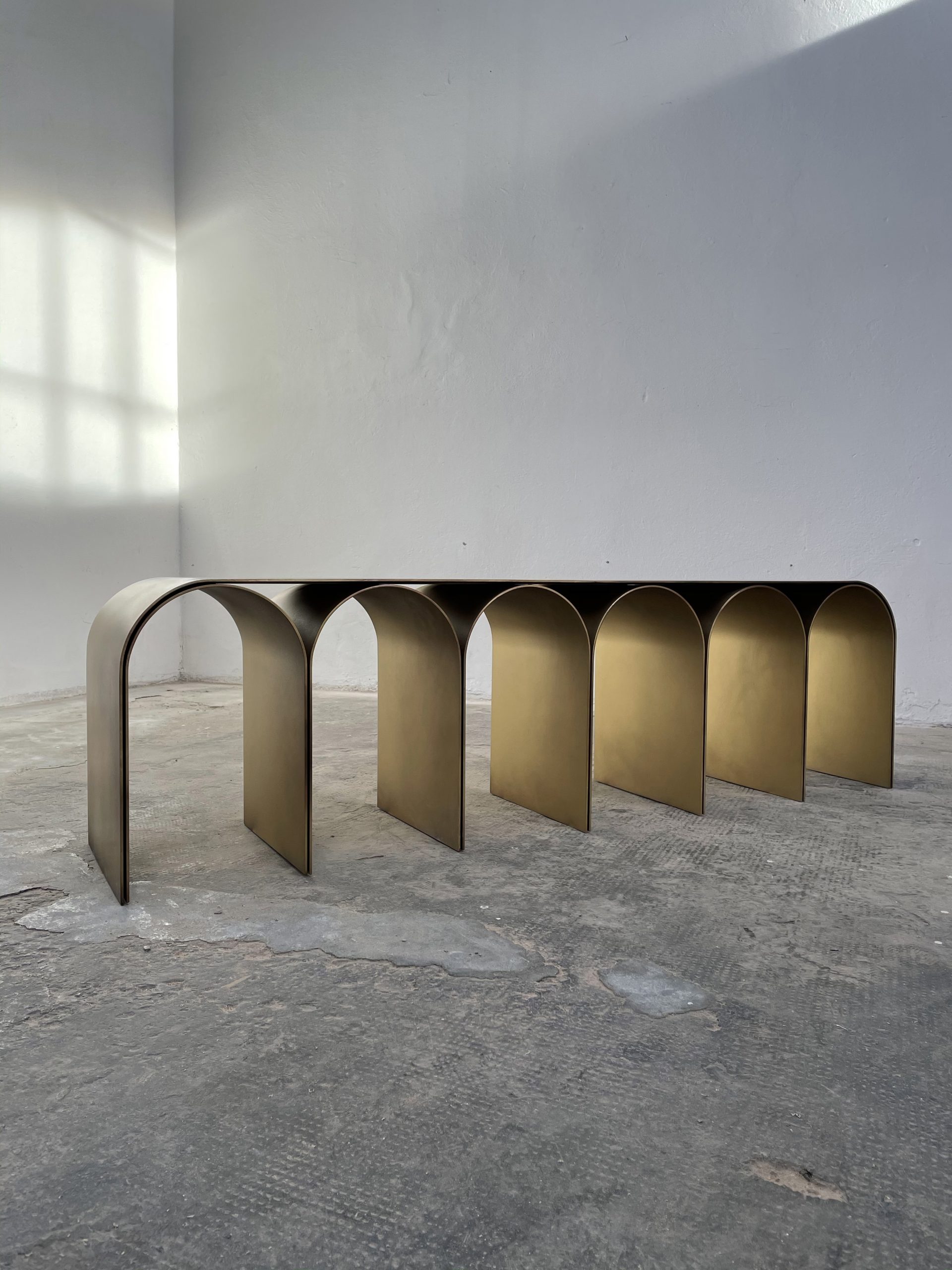 Gold Arch Console is a table by Pietro Franceschini