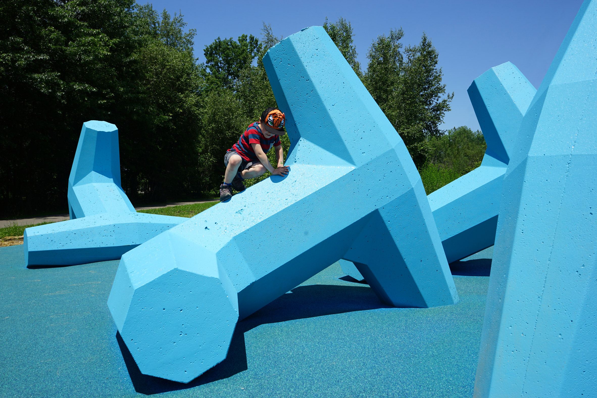 The playground's rubber surface acts as fall protection