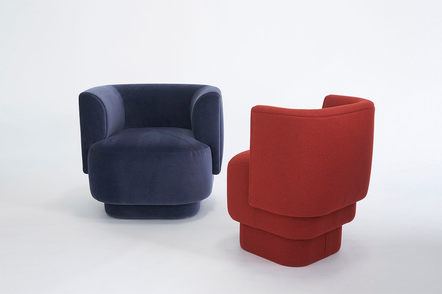 Capper upholstered lounge chairs