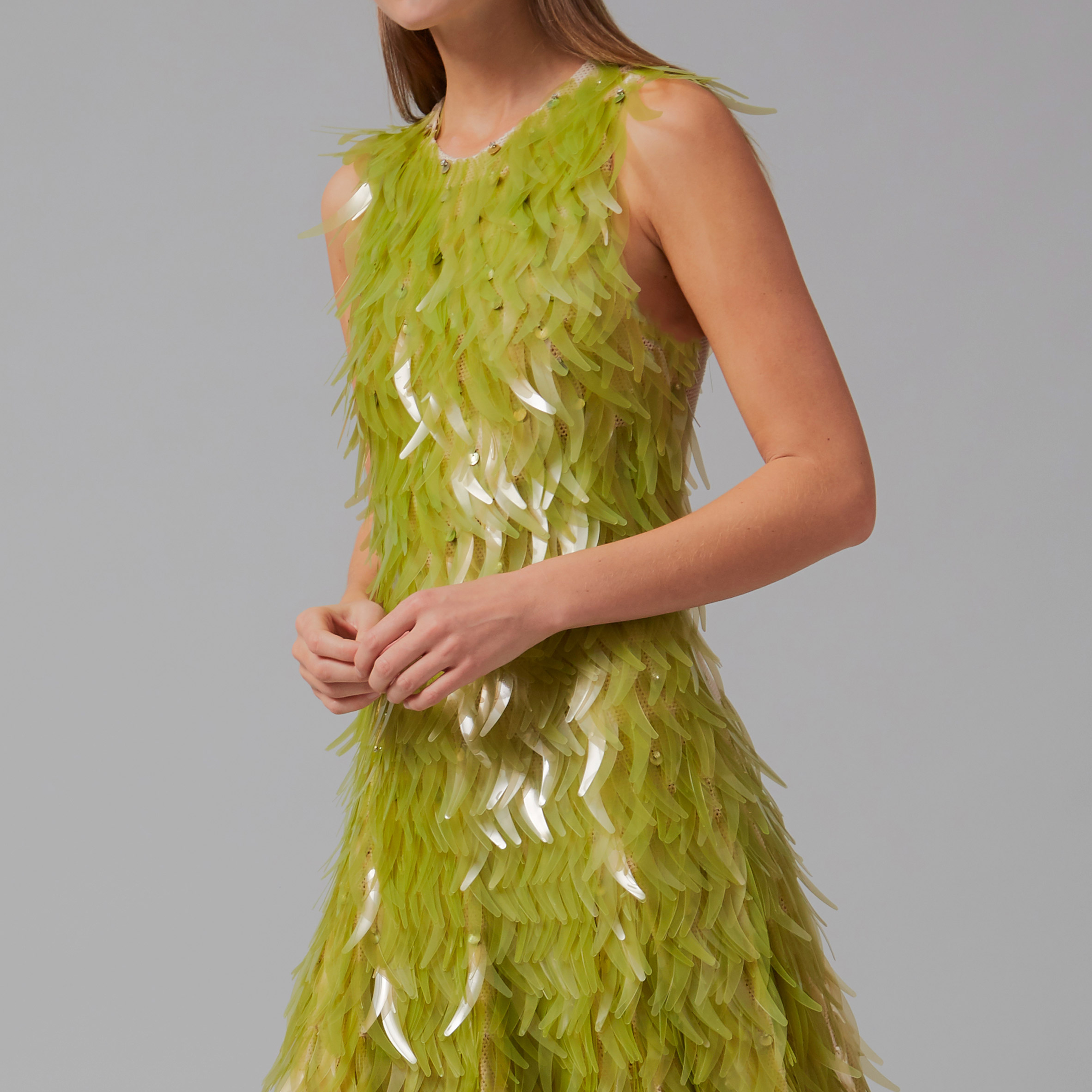 Close up of algae sequin dress by Phillip Lim and Charlotte McCurdy as part of One X One project