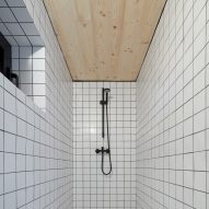 White tiled shower room