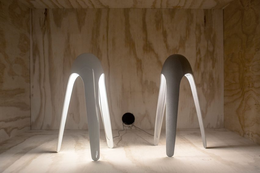 Two white Cyborg lamps by Karim Rashid