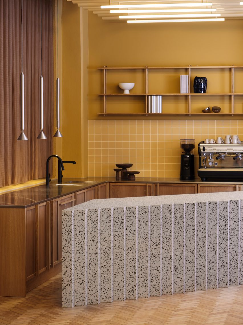 Yellow ceramic tiles and gray countertop