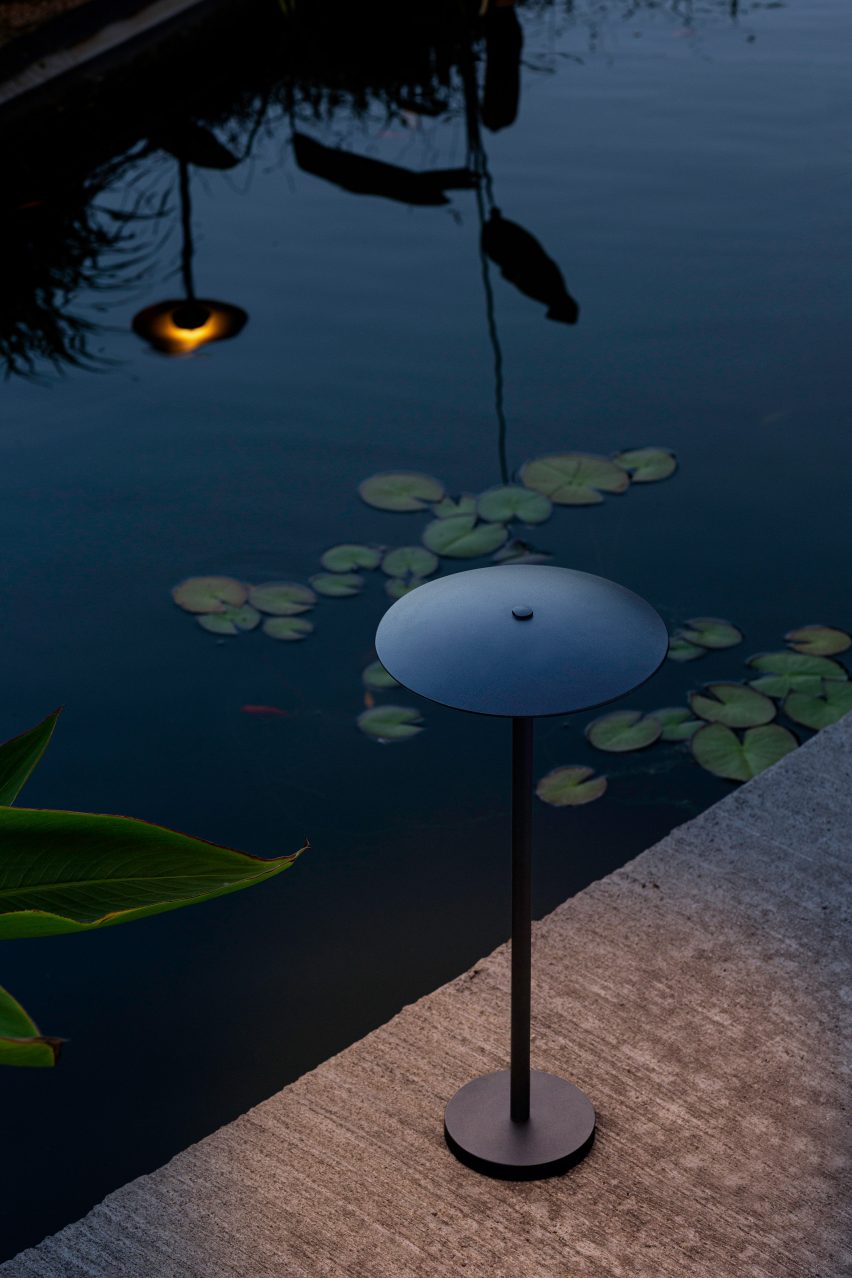 A black outdoor floor lamp by Marset