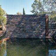The slate exterior of a meditation room by Nicholas Burns