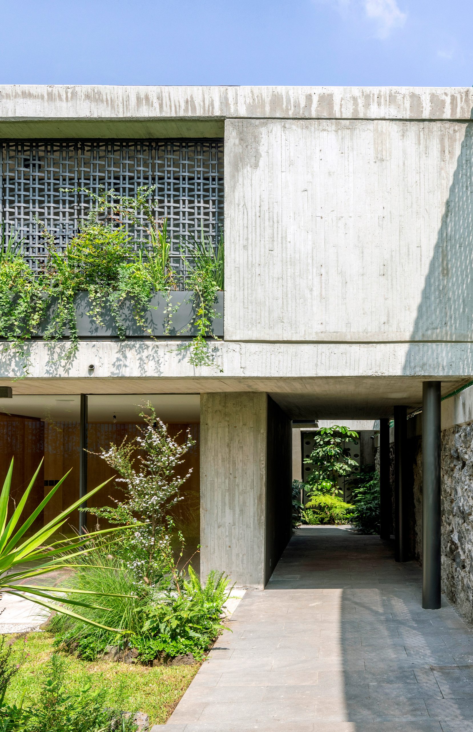 Lattice screens and concrete walls of a house in Mexico City