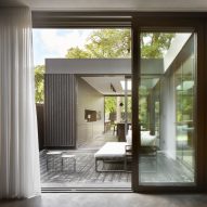McGinlay Bell uses courtyards to bring light and views into House in Bearsden
