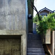 A concrete facade of a Japanese house