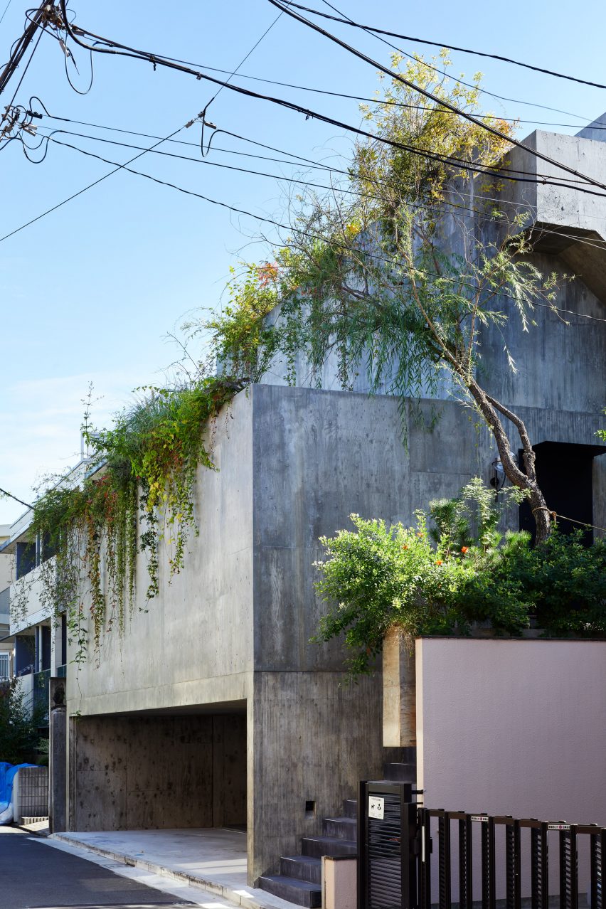 The exterior of a stepped concrete house in Japan