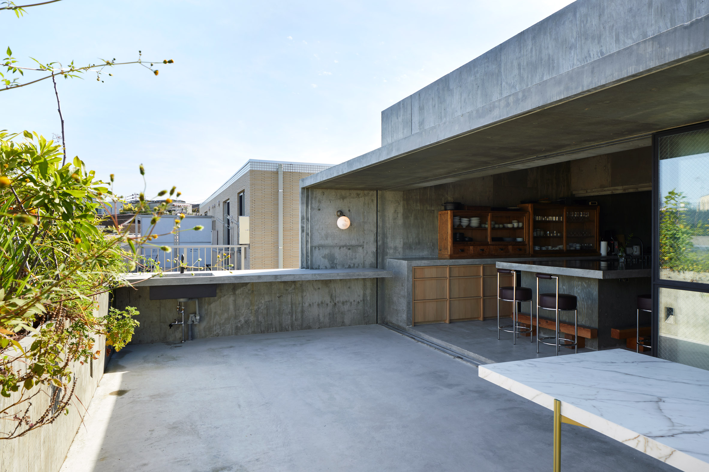 A Japanese restaurant's concrete roof terrace