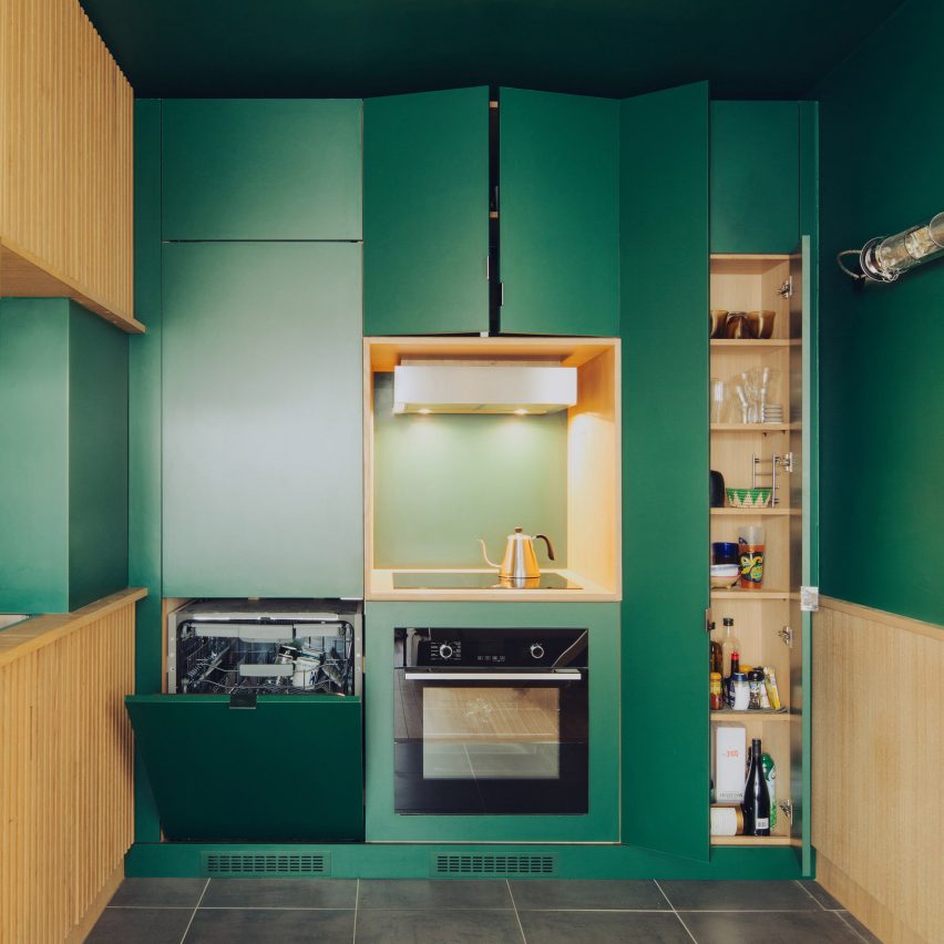 Green kitchen in Paris apartment 