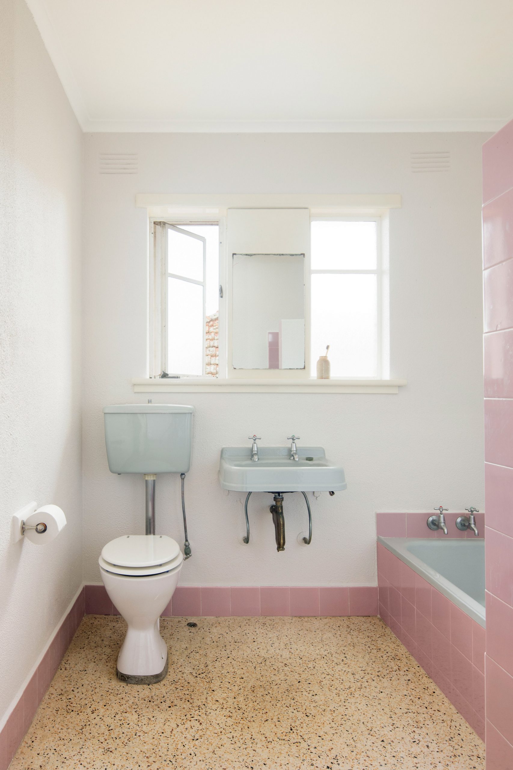 Original pink and blue bathroom of Brunswick apartment by Murray Barker and Esther Stewart