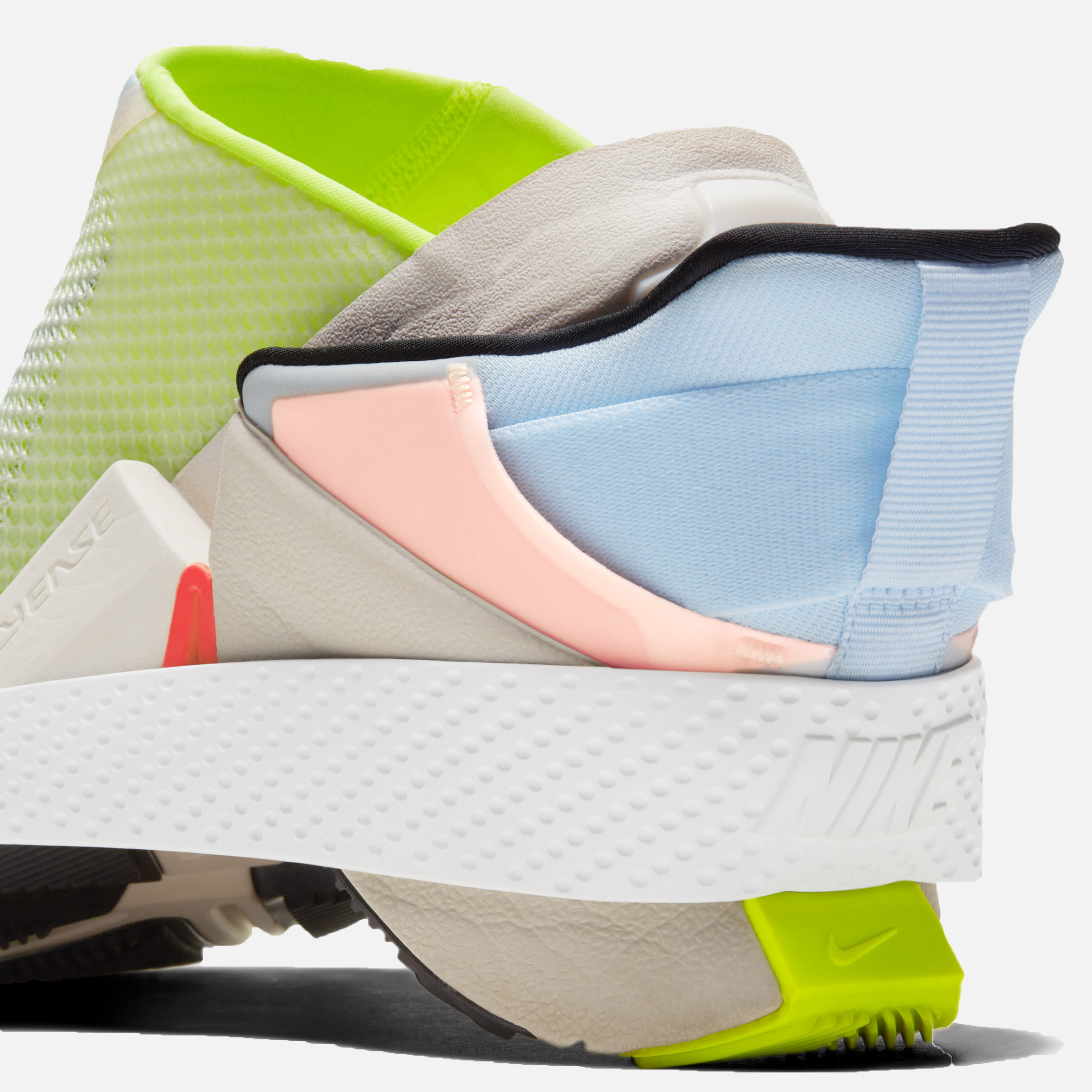 Bi-stable hinge within the Nike GO FlyEase