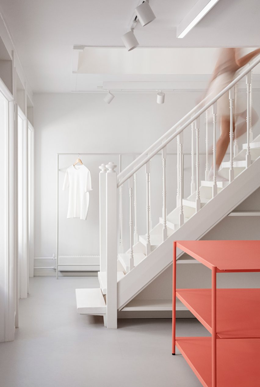 Traditional wooden staircase in the OCE Copenhagen store interior by Aspekt Office