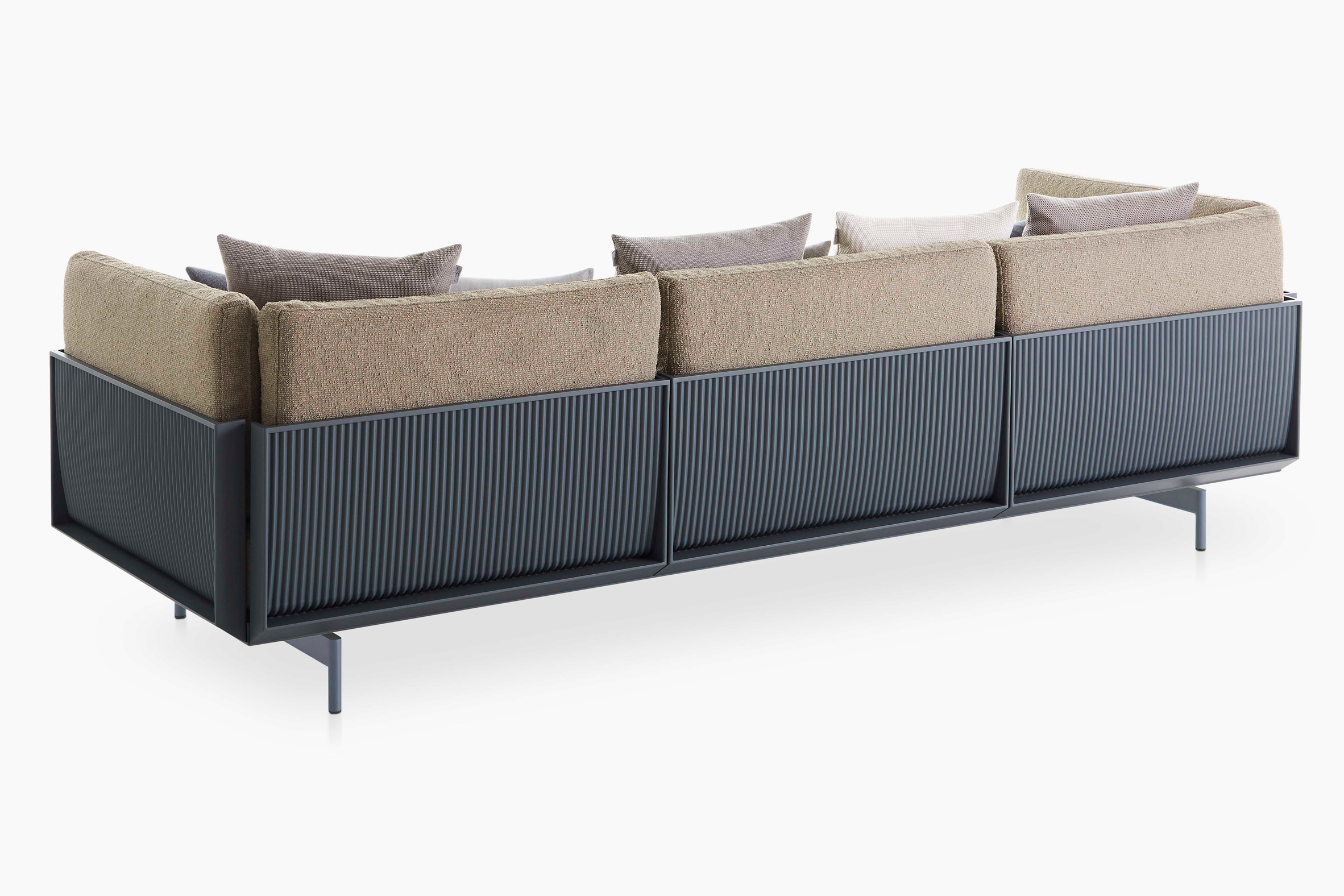 The corrugated metal back of a sofa by Luca Nichetto for Gandia Blasco