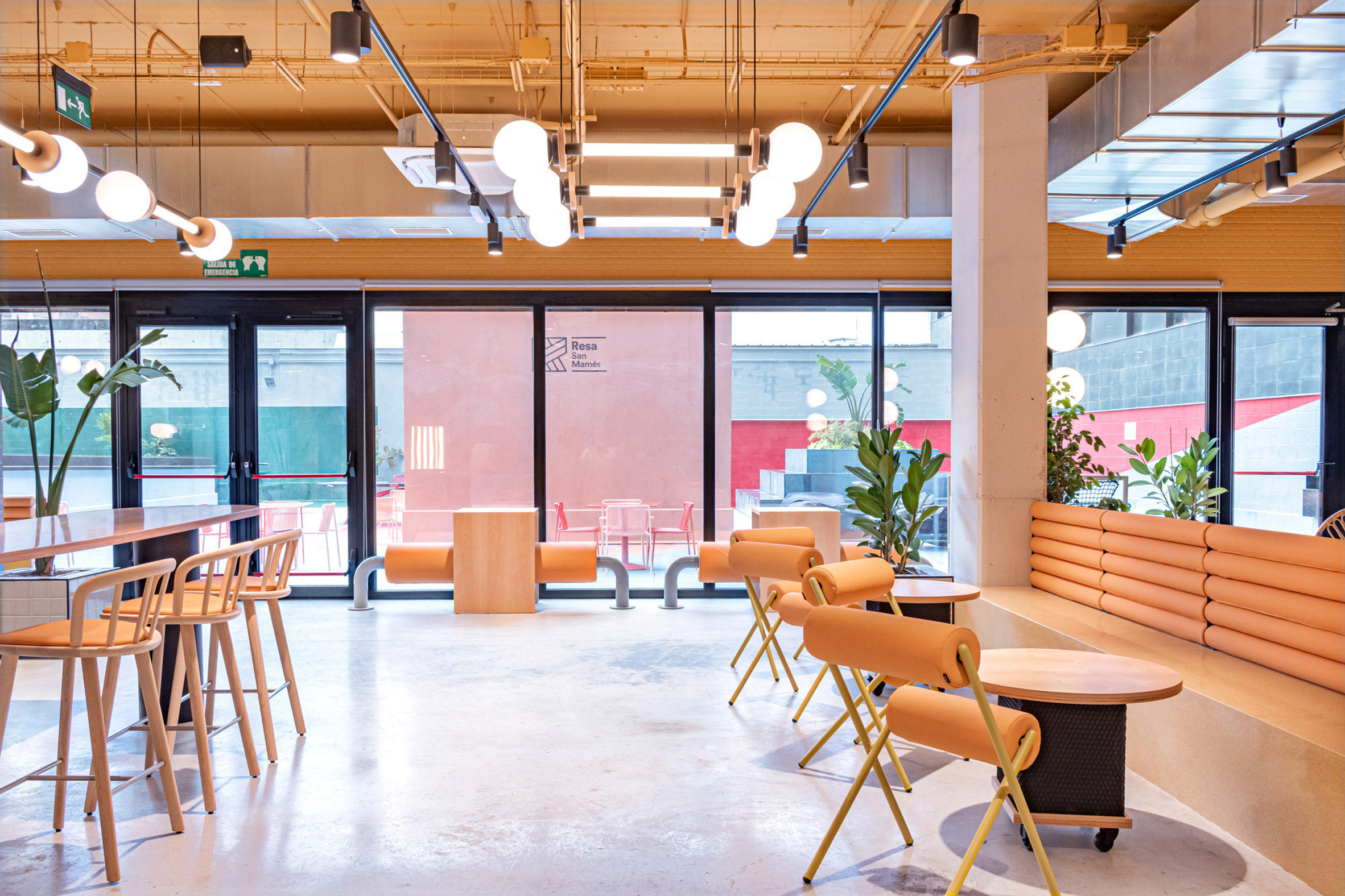 Masquespacio creates colour-blocked interiors for Resa student housing