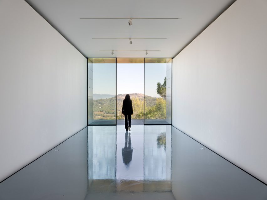 Gallery with views across a vineyard