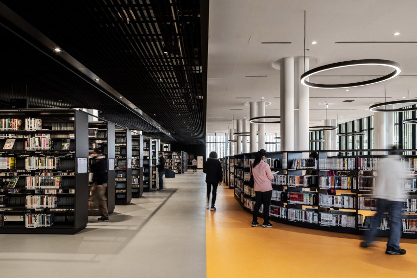 A library with a contrasting yellow and black interiors