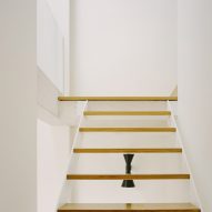 A minimalist open-tread staircase in a Parisian townhouse by Clément Lesnoff-Rocard