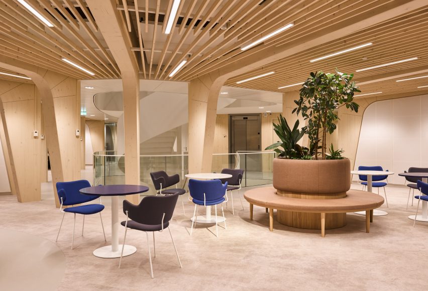 An office with an exposed-timber structure