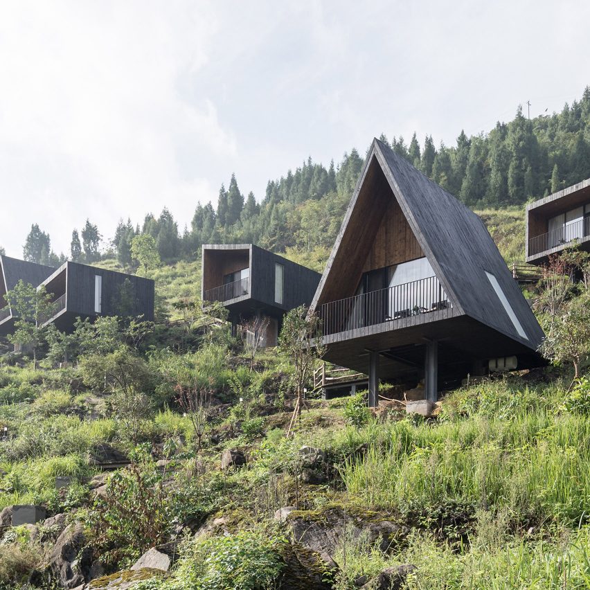 Different shaped cabins placed along a mountain terrain