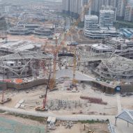 A construction photo of the Zhuhai Jinwan Civic Art Centre by Zaha Hadid Architects