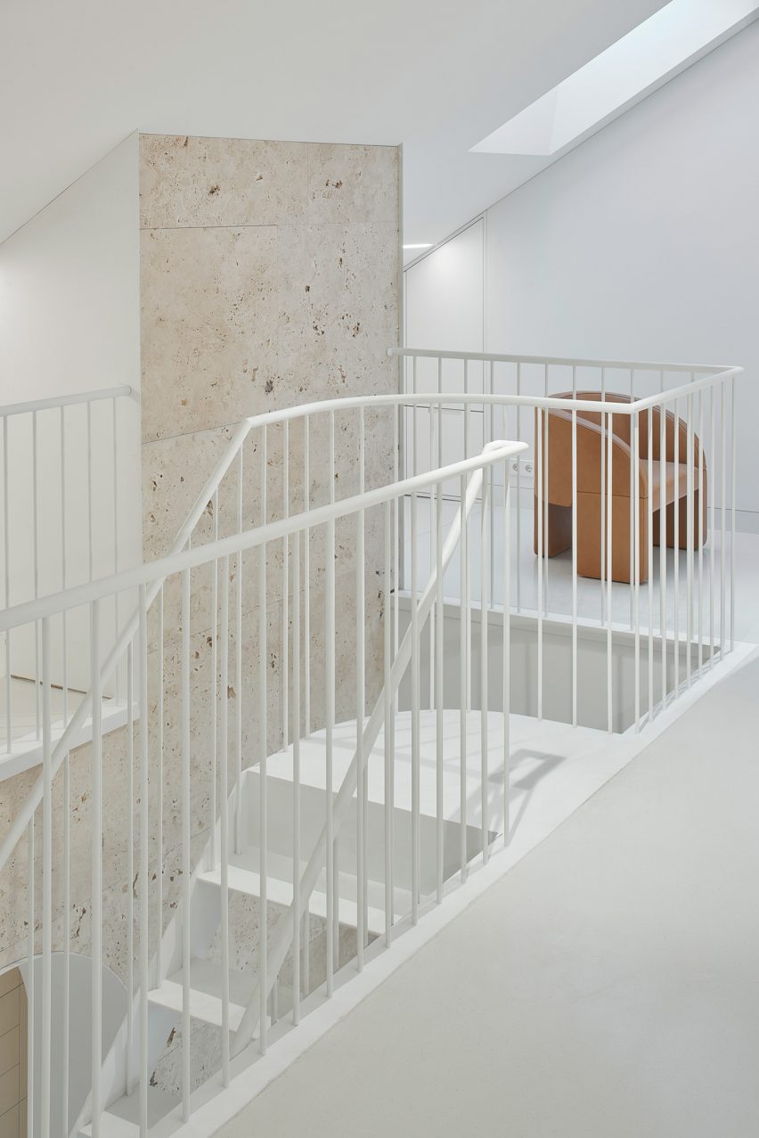 White steel staircase in Vilnius apartment by 2XJ