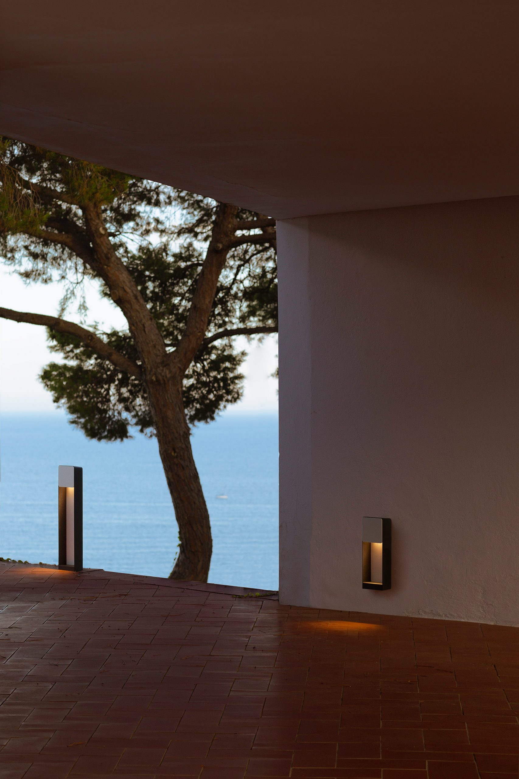 Lab outdoor lamp by Francesc Rife for Marset on a terrace