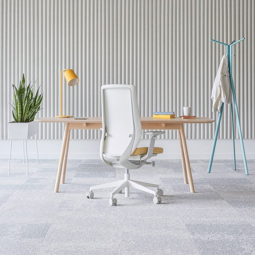 A white office chair with a mesh backrest by ITO Design for Profim