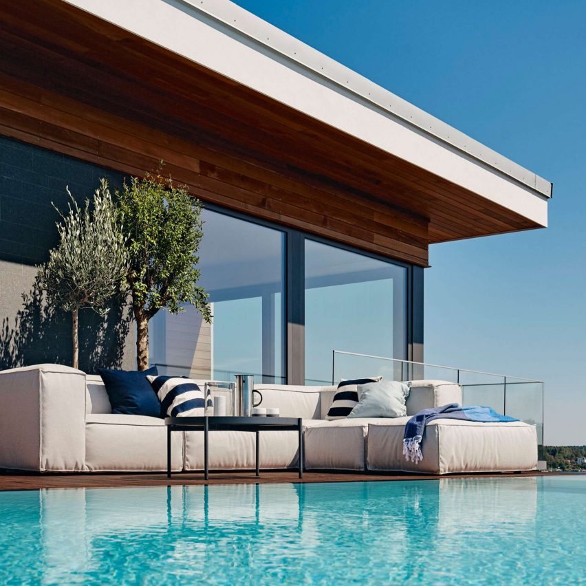 Asker sofa by Martin dos Santos for Skargaarden on a poolside deck