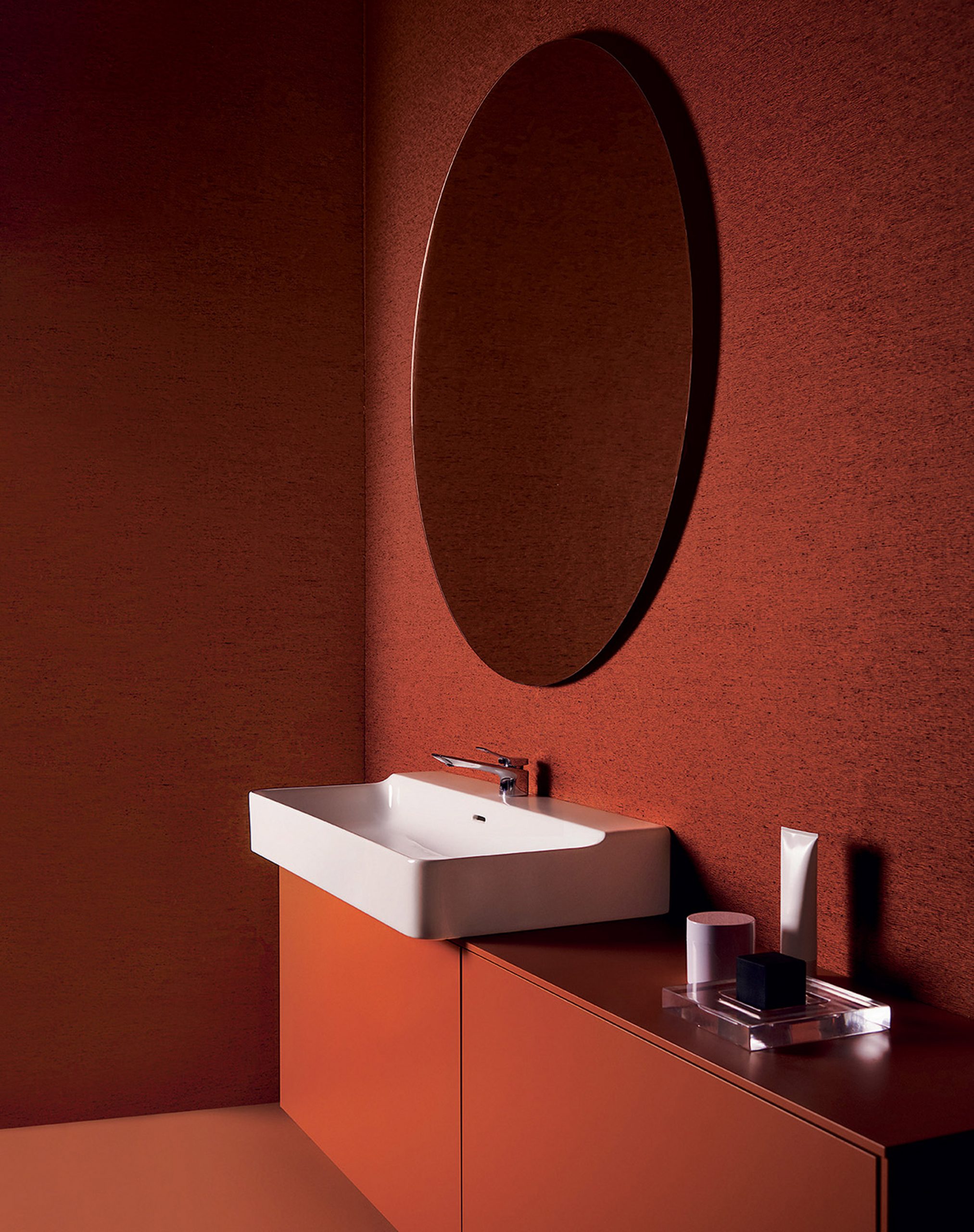 A washbasin and bathroom furniture by Ideal Standard