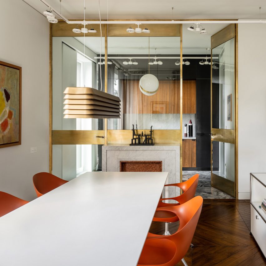 Dining room and kitchen of the Apartment of Basta by Blockstudio