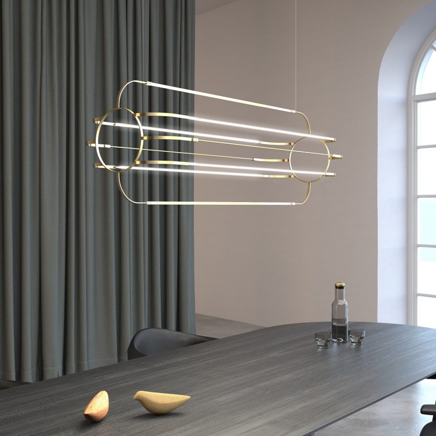 Charlotte pendant light by Daniel Becker Studio above a dining table