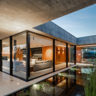 Small pool divides concrete house